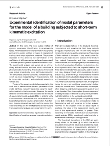 Experimental identification of modal parameters for the model of a building subjected to short-term kinematic excitation